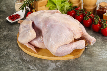 Raw whole chicken for cooking