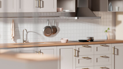 A bright beige-toned kitchen interior with sunlight 
coming through the window.