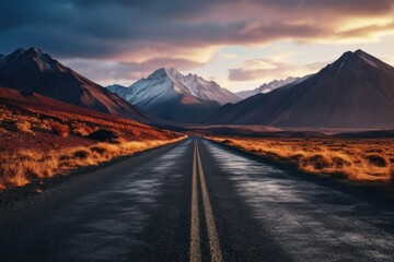 Canvas Print - A picture of an empty road with mountains in the background. Suitable for travel and adventure themes