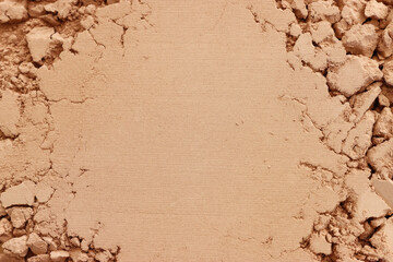 background of brown sandy powder. concept of beauty, texture and cosmetics mock up