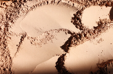 Background of brown sandy powder. concept of beauty, texture and cosmetics mock up