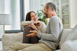© LIGHTFIELD STUDIOS - joyful child-free couple talking on couch in modern living room, quality time at cozy home
