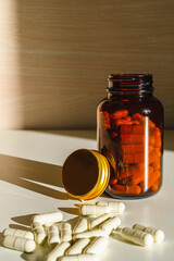 Wall Mural - Jar with pills on a white background. View from above. Morning routine