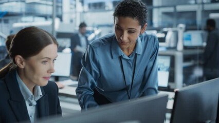 Aufkleber - Caucasian Female Engineer And Hispanic Product Manager Using Desktop Computer And Talking At Automated Factory With Robotic Hands. Indian Facility Worker Using Soldering Jet Printer On Background.