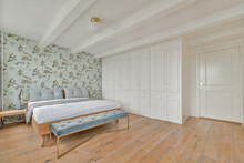 Elegant Bedroom With Floral Wallpaper And Modern Furniture