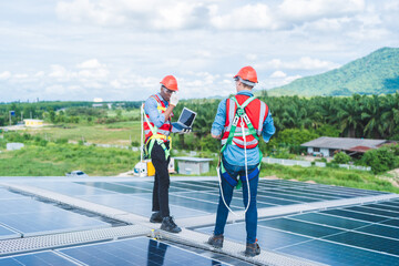 Wall Mural - Architectural engineering team working on solar panels and his blueprints with Solar photovoltaic equipment on construction site. meeting and discussing to design planning for clean energy concept