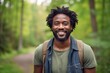 Portrait of a happy afro-american man in his 30s wearing a rugged jean vest against a bright and cheerful park background. AI Generation