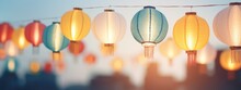 Colorful Hanging Lantern Traditional Asian Decor On Blurred Street. Chinese Lantern Festival. New Year Abstract Greeting Background With Copy Space. Design For Poster, Card, Banner