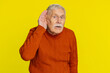 © Andrii Iemelianenko - I can't hear you. What. Senior old man trying hear you, looking confused and frowning keeping arm near ear for louder voice asking to repeat to hear information deafness. Elderly pensioner grandfather