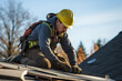© Anastasiia - Construction Worker Laying Shingles On Roof