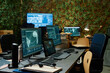 © Seventyfour - Part of spacious office of secret service with group of computer screens with various data on workplaces of officers or operators
