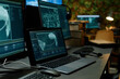 © Seventyfour - Laptop with secret data on screen standing on workplace of military officer or operator against computer monitors and office interior