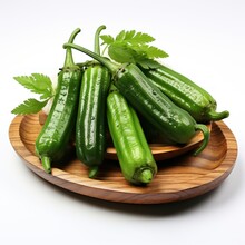 Fresh Okra Or Lady Finger Or Bhindi In Wooden Bowl
