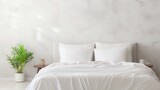 Fototapeta  - comfortable clean white bed with duvet and soft sheets in bright room with pillows