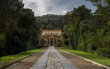 Canvas Print - long road leading to the entrance of Napoleon Bonaparte summer residence in exile on Elba Island