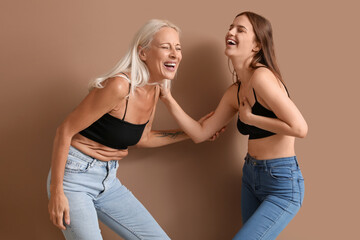 Sticker - Body positive women laughing on beige background