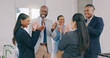 © Wesley JvR/peopleimages.com - Business people, applause and promotion with celebration, smile and excited with victory, winning and teamwork. Opportunity, achievement and cheering with staff, clapping and cooperation with support