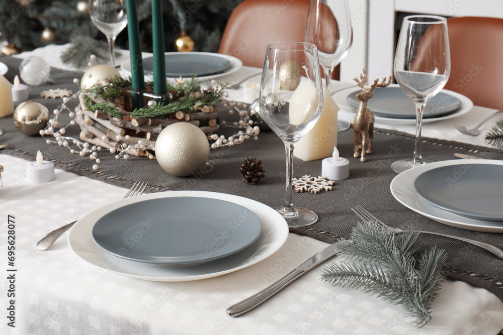 Dining table served for Christmas celebration, closeup