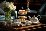 Fototapeta  - Elegant afternoon tea setup with fine china and delicate pastries.