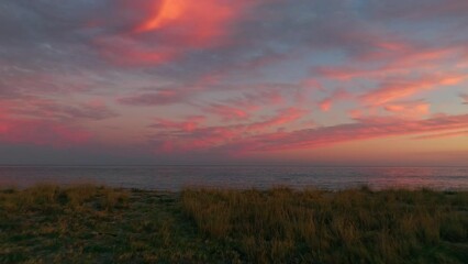 Wall Mural - The Coast And The Red Celestial Sunset Sky