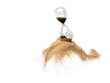 © Jade - Hourglass and Sand fly in mid air, add more sand of time on gold sand over white background. Brown hourglass show more time Deadline extended time management hope concept hour glass