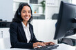 © Kawee - Portrait of Latino beautiful business woman smile while work in office.