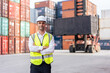 © Kawee - Portrait of Caucasian engineer worker work in container port terminal.