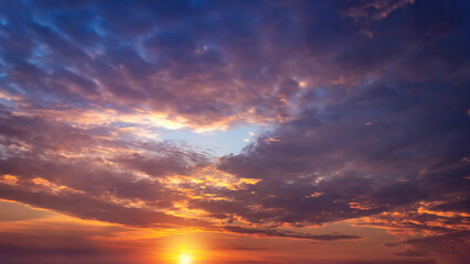 Colorful cloudy sky at sunset. Gradient color. Sky texture, abstract nature background. Pink sky on a summer morning or evening.