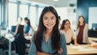 © CStock - Smiling young Asian designer with colleagues ,School or university