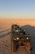 © Marcel - quads in the endless Makgadikgadi salt flat of Botswana during sunset