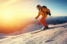A man riding skis down a snow covered slope. Perfect for winter sports or outdoor adventure themes