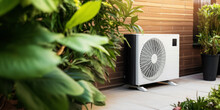 Air Source Heat Pump, AC Unit Installed Outdoors At Home