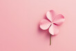 Pastel pink four leaf clover. Concept of luck, fortune, rarity, nature.
