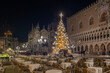 Venice, Italy: Christmas tree with lights in San Marco square in the evening
