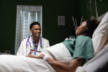 African conversation between the patient and the doctor occurs in the hospital room regarding the treatment.