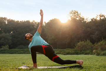 Sticker - Man practicing yoga outdoors on sunny day