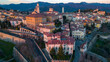 Citta Alta - Bergamo, Italy. Drone aerial view of the old town during sunrise. Landscape at the city center, its historical buildings.