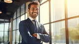 Fototapeta  - Confident Middle-Eastern businessman in a suit standing in an office