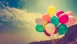 colorful balloons done with a retro instagram filter effect concept of happy birth day in summer and wedding honeymoon party use for background vintage color tone style