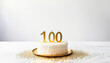 100 years old or century anniversary or birthday with cake and candles and copy space