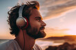 © Tetiana - Generative AI photo picture of happy person walking seaside looking sunrise and listening music