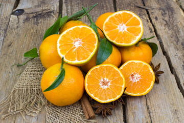 Poster - fresh tangerines on wooden background