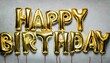words happy birthday made of golden inflatable balloons on white background gold foil helium balloons forming phrase birthday congratulations concept hbd phrase happy birthday wishes