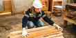 © chokniti - woman carpenter worker wearing safety uniform working to quality control checking of wooden products at workshop manufacturing. female technician making wooden in carpenter's shop industry warehouse.