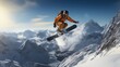 young man jumping with snowboard in snow