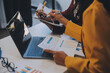 © ARMMY PICCA - Co working conference, Business team meeting present, investor executive colleagues discussing new plan financial graph data on outdoors office table with laptop and tablet, Finance, accounting