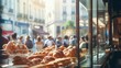 Bakeries shop displaying a variety of fresh breads, surrounded by blurred tourists in a lively street