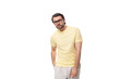 © Ivan Traimak - handsome young brunette man with a beard put on glasses for vision correction