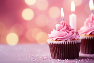 Sticker - Birthday cupcakes with pink buttercream frosting and burning candle on bokeh background, A birthday cupcake with candles on a pink background with bokeh, AI Generated