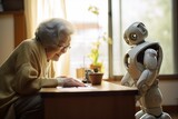 Fototapeta  - a female elderly lady playing with a smart robot